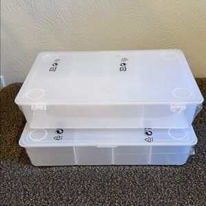 A pack of 2 White Compartment Storage Box New
 Never used.